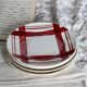 Assiettes à dessert vintage en faïence dépareillées avec motifs rouges