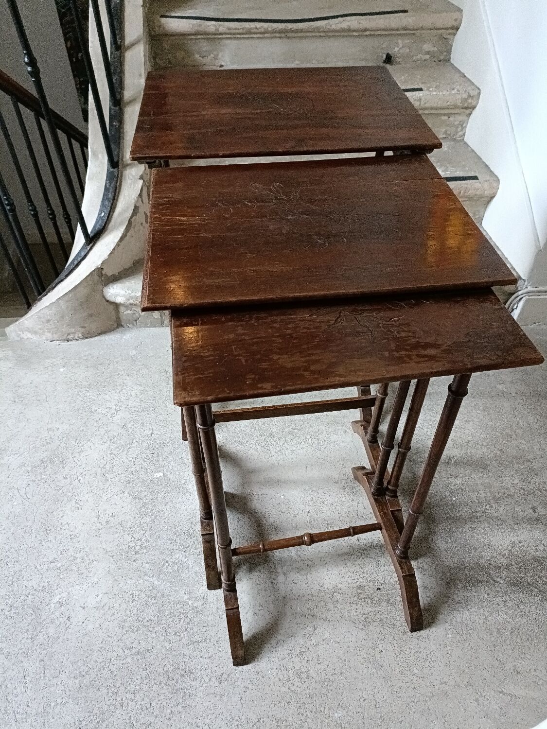 Stackable tables with pyrography.