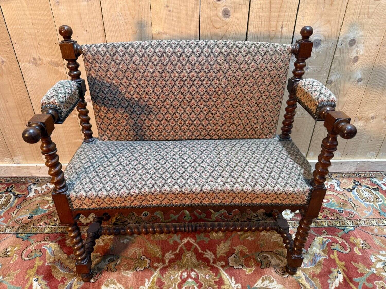 Small office bench in mahogany in the Louis XIII style.