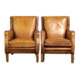 Ensemble de fauteuils en cuir couleur cognac clair de style anglais.