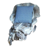 Blue cushion with royal pattern