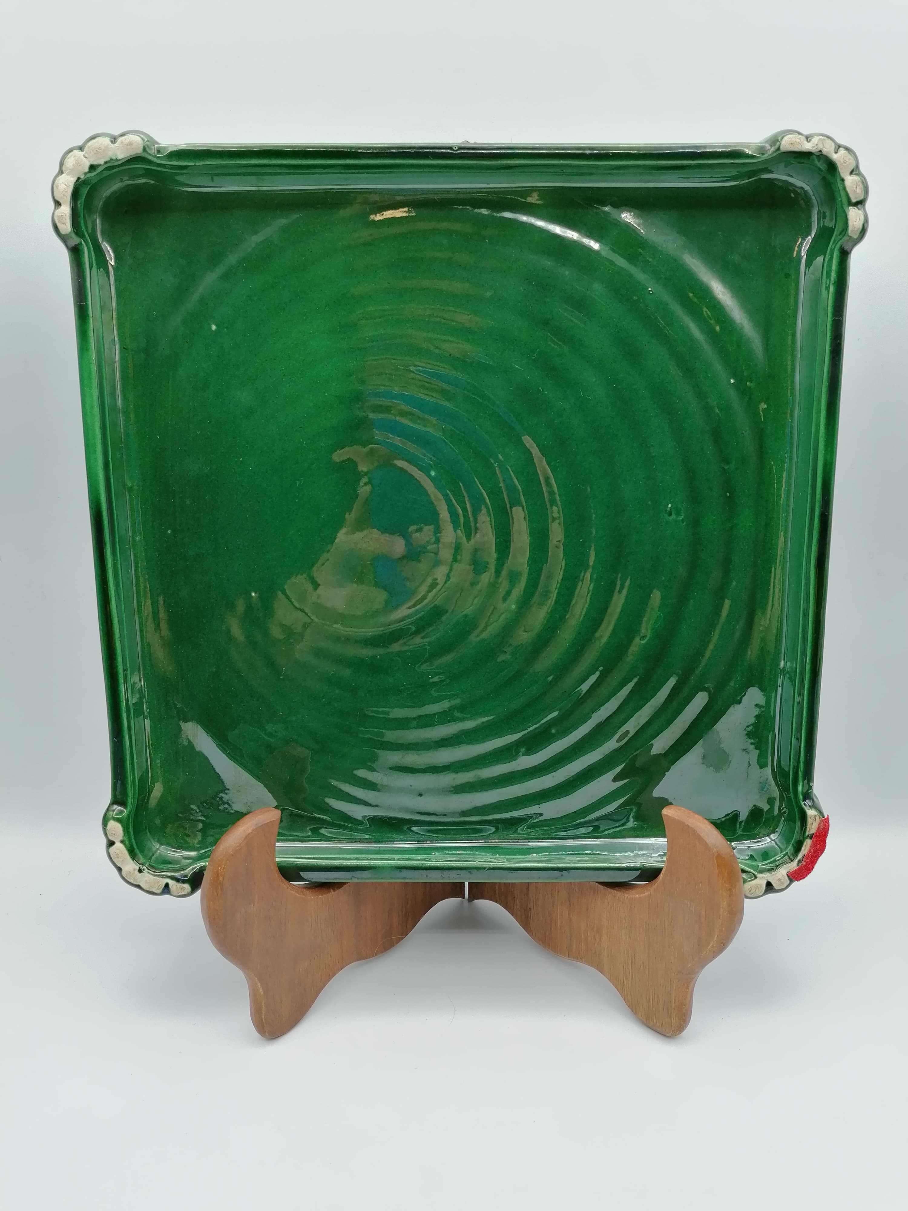 Under the plate and 3 under the bottle