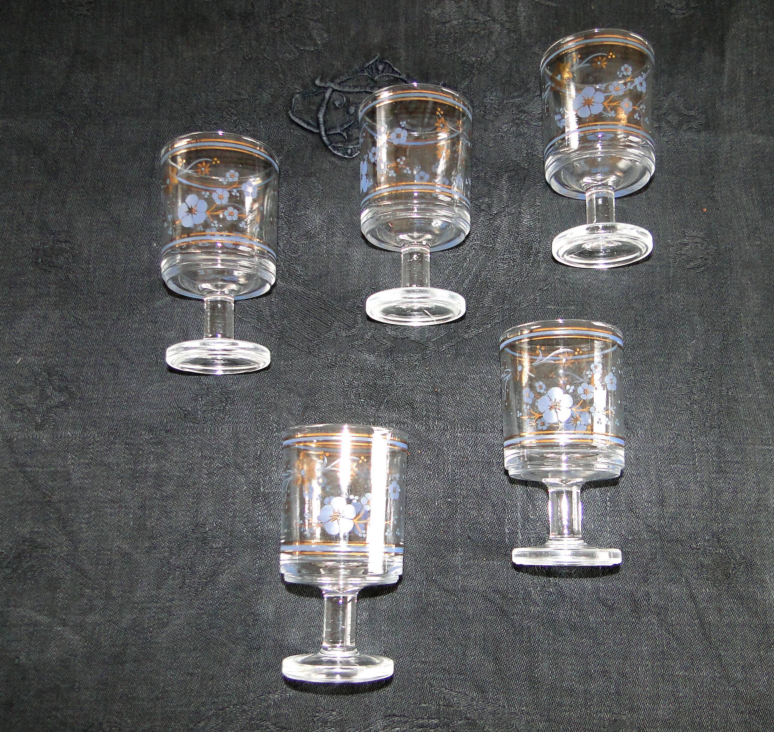 5 old glasses on foot floral decoration blue and gold vintage crystal?