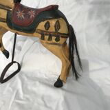 Wooden horse with period ironwork support