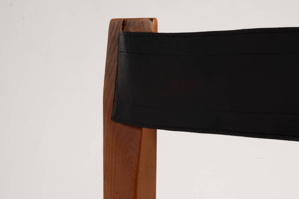 Pierre Chapo. Series of 8 "S11" chairs in elm and leather. 1960s-70s.