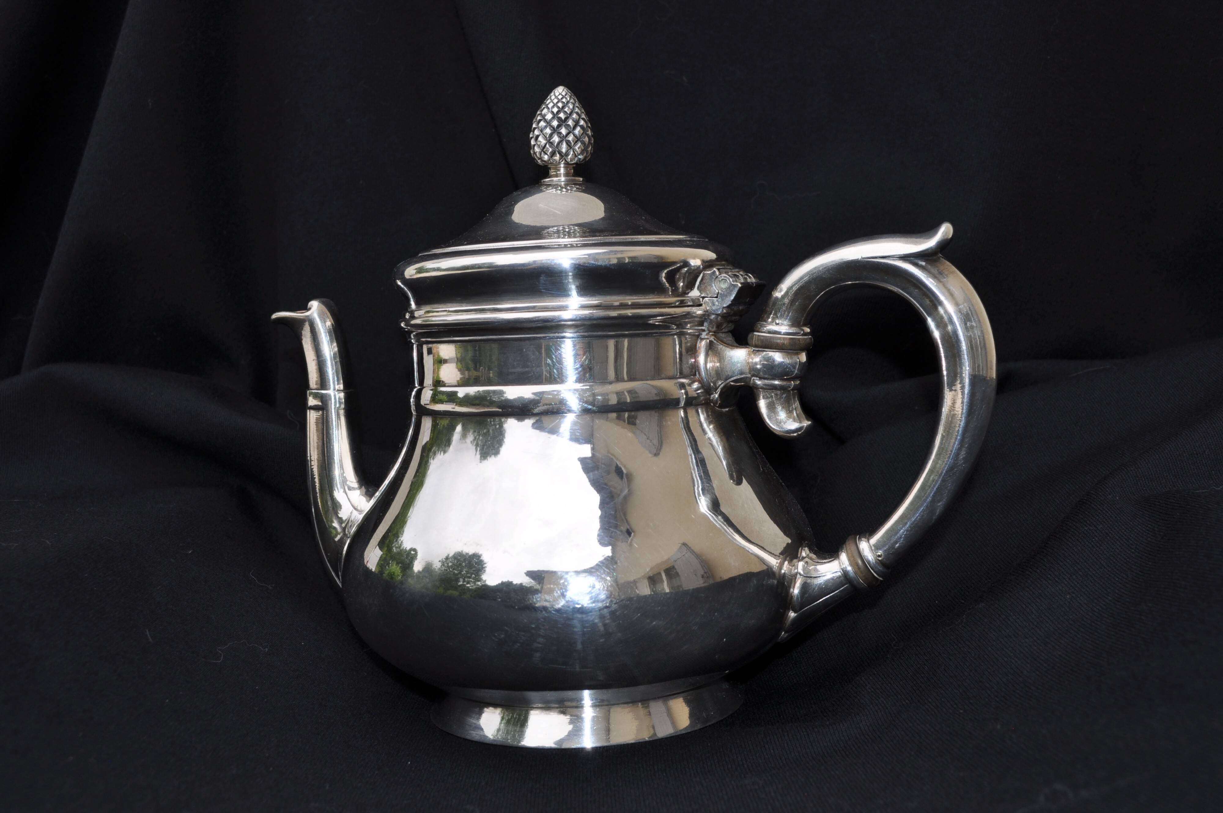 Christofle teapot with pine cone