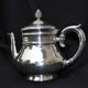 Christofle teapot with pine cone