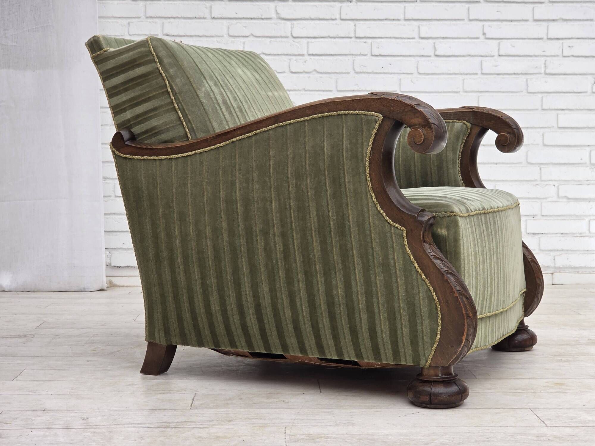 1950s, Danish relax armchair, green furniture velour, carved oak wood.