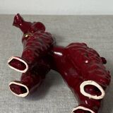 Burgundy and gold ceramic dog