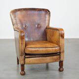 Fauteuil unique en cuir de mouton ancien
