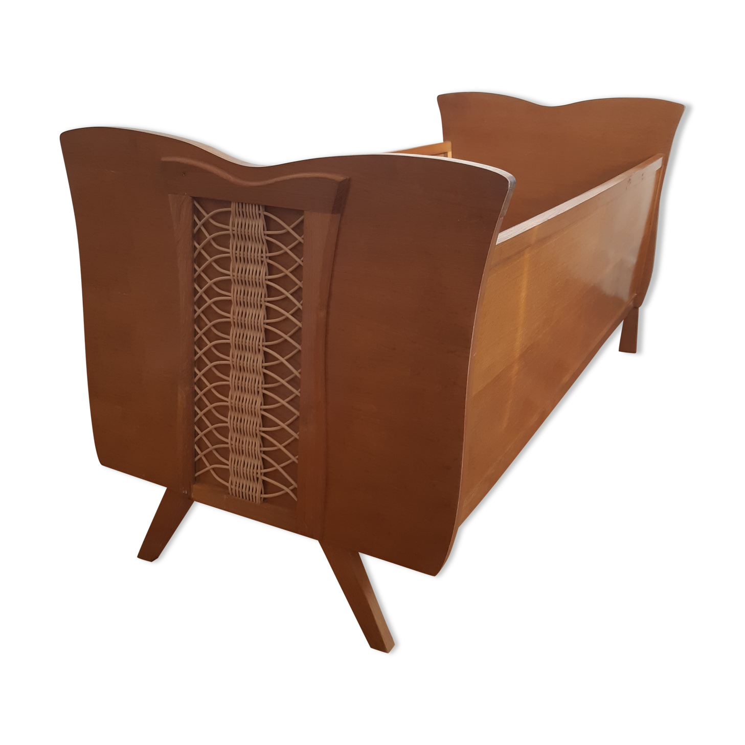 Wooden bed and vintage rattan