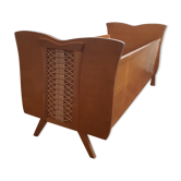 Wooden bed and vintage rattan