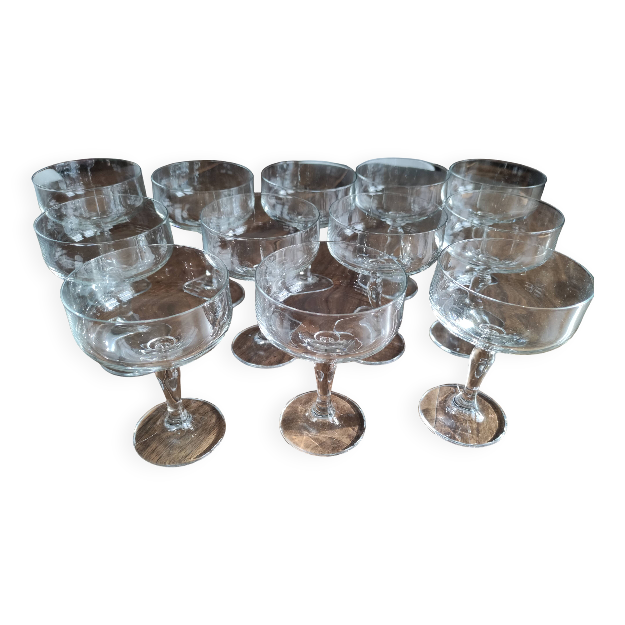 Set of 12 vintage glass champagne glasses with curved foot