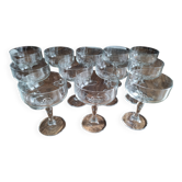 Set of 12 vintage glass champagne glasses with curved foot