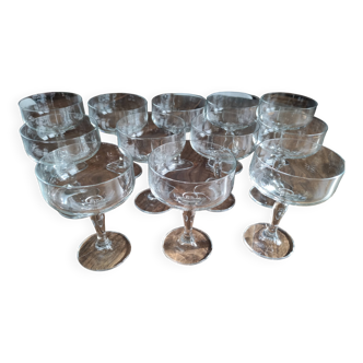 Set of 12 vintage glass champagne glasses with curved foot