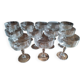 Set of 12 vintage glass champagne glasses with curved foot