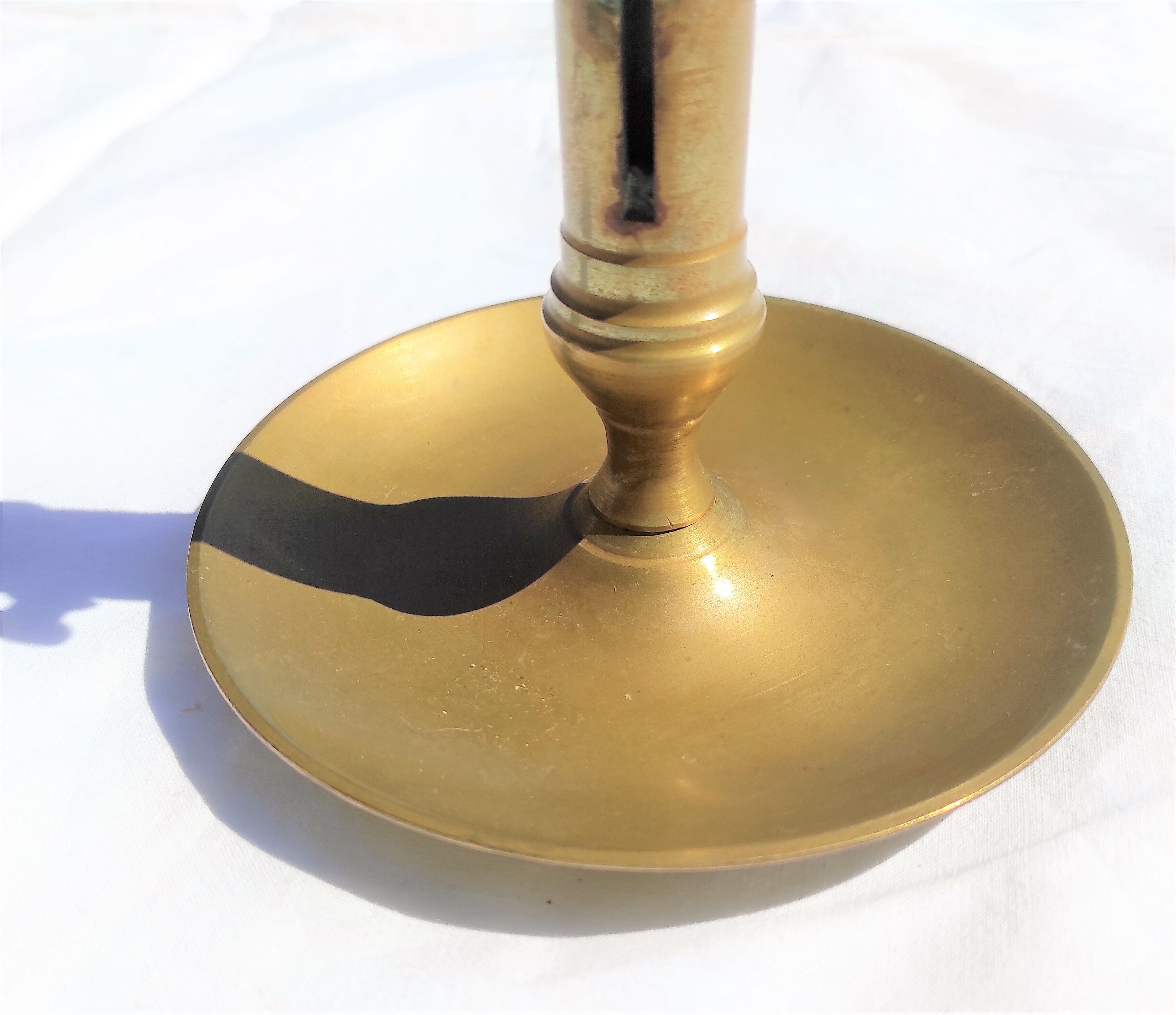 Antique brass candle holder