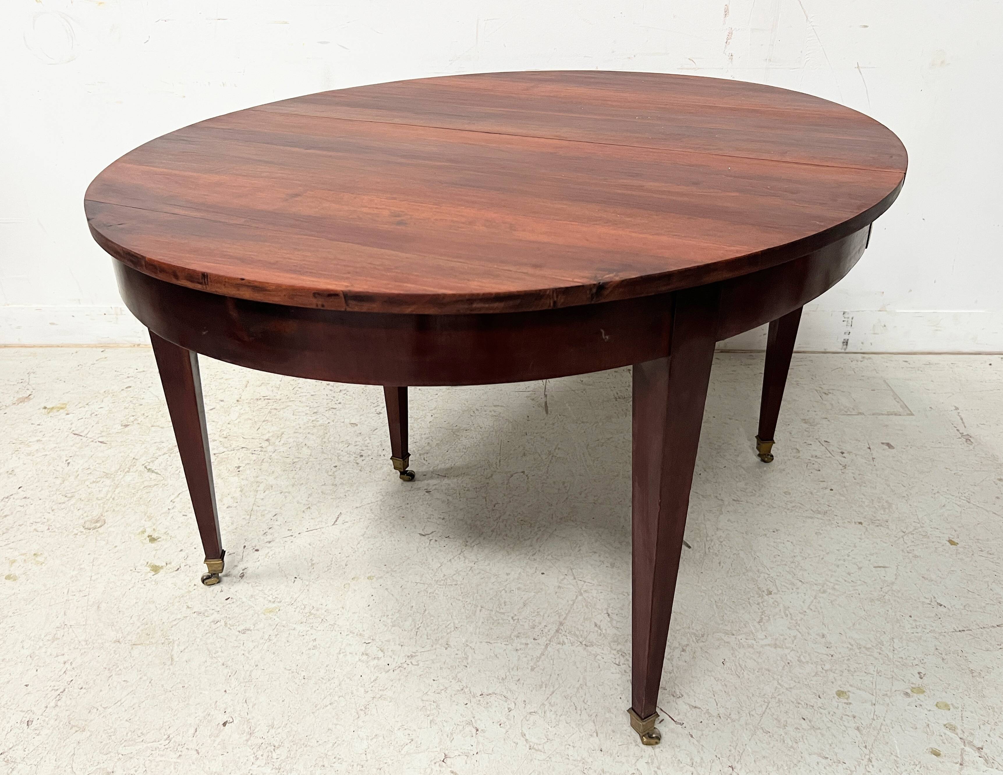Louis XVI style bandeau table with 6 XIX century tapered legs.