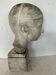 Bust of a young man in plaster signed Gerard Choain XX century