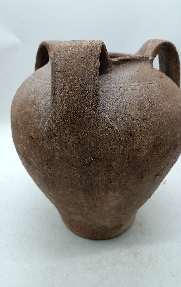 Antique terracotta jug from the 16th century