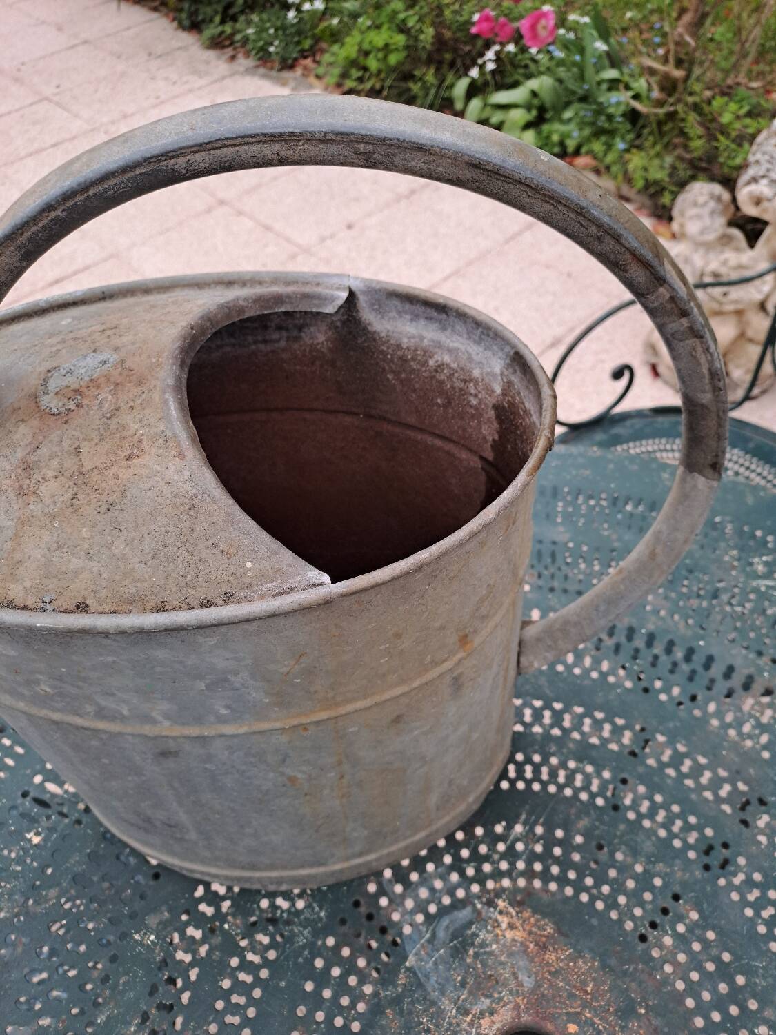 Old zinc watering can