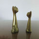 Couple of stylized cats in brass 70s
