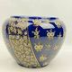 Limoges porcelain flowerpot with gold enamel decoration and blue relief flowers from Four