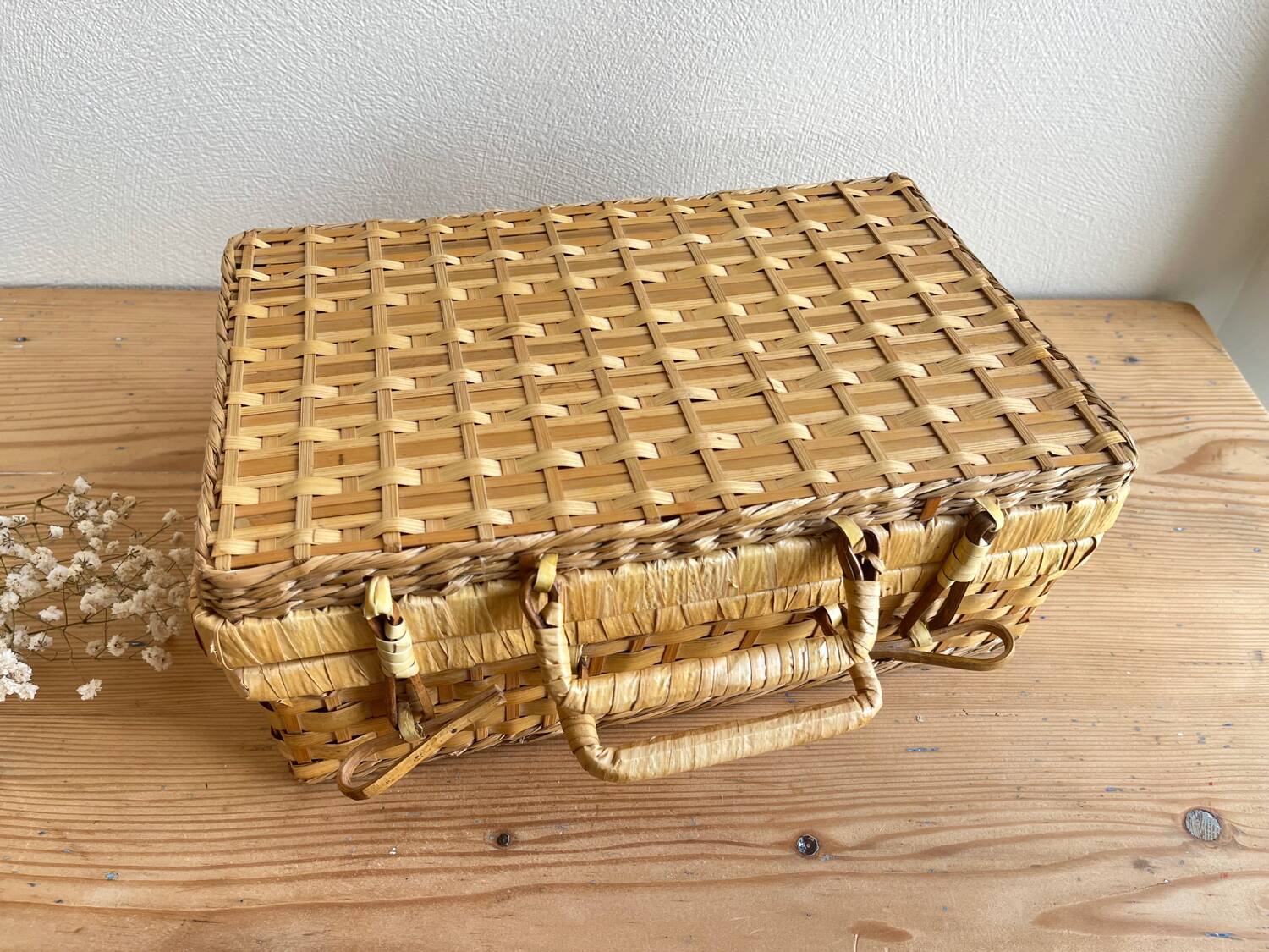 Vintage woven wicker suitcase