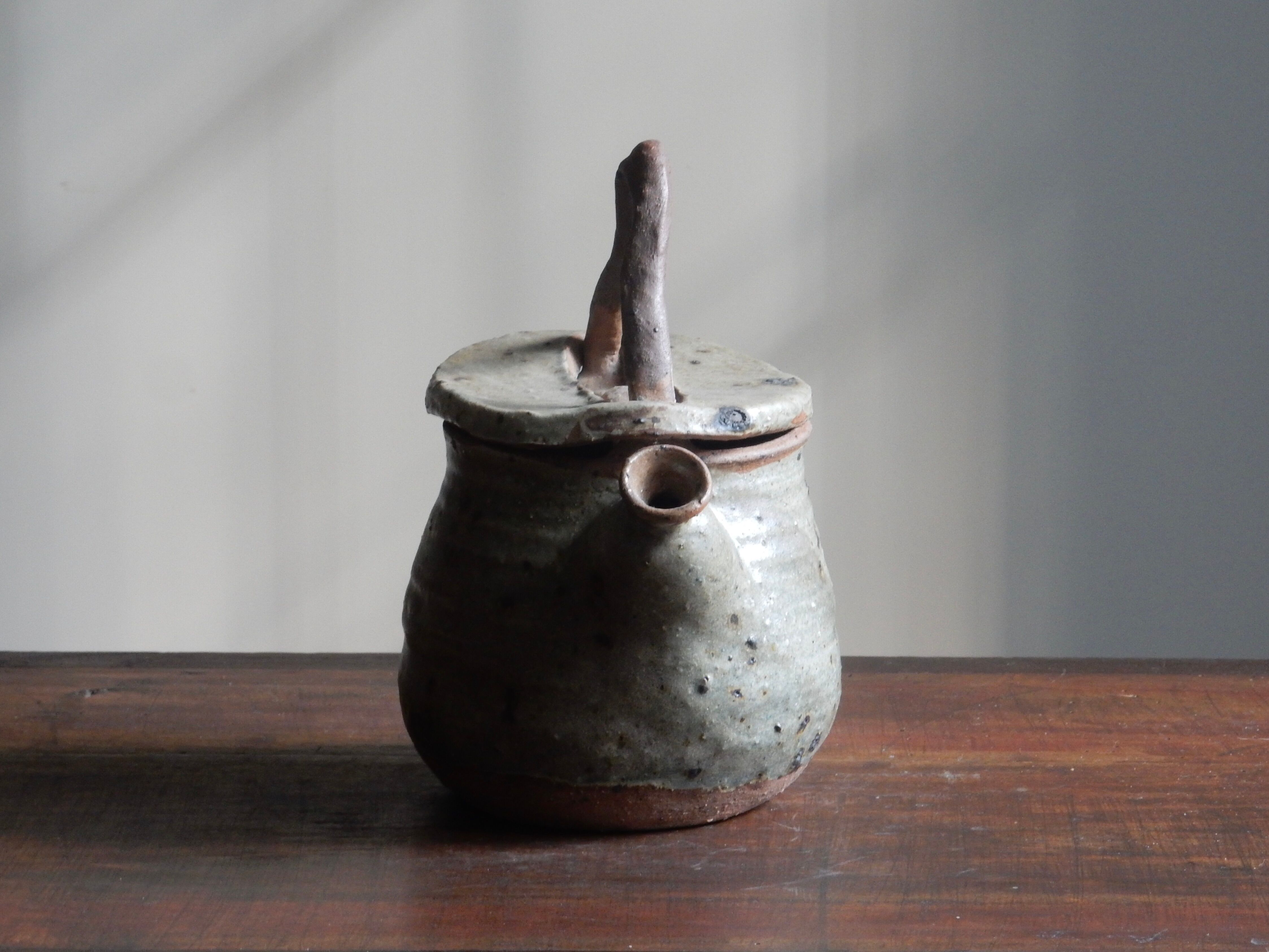 Homemade teapot in pyrity sandstone