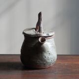 Homemade teapot in pyrity sandstone