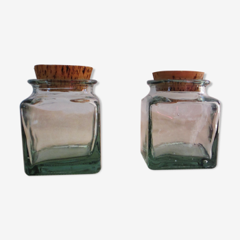 2 glass jars with crouted cork stopper
