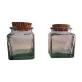2 glass jars with crusted cork stopper
