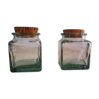 2 glass jars with crusted cork stopper