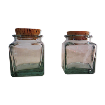2 glass jars with crusted cork stopper
