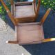 Pair of walnut bedside tables in Louis XVI style with brass inlay.