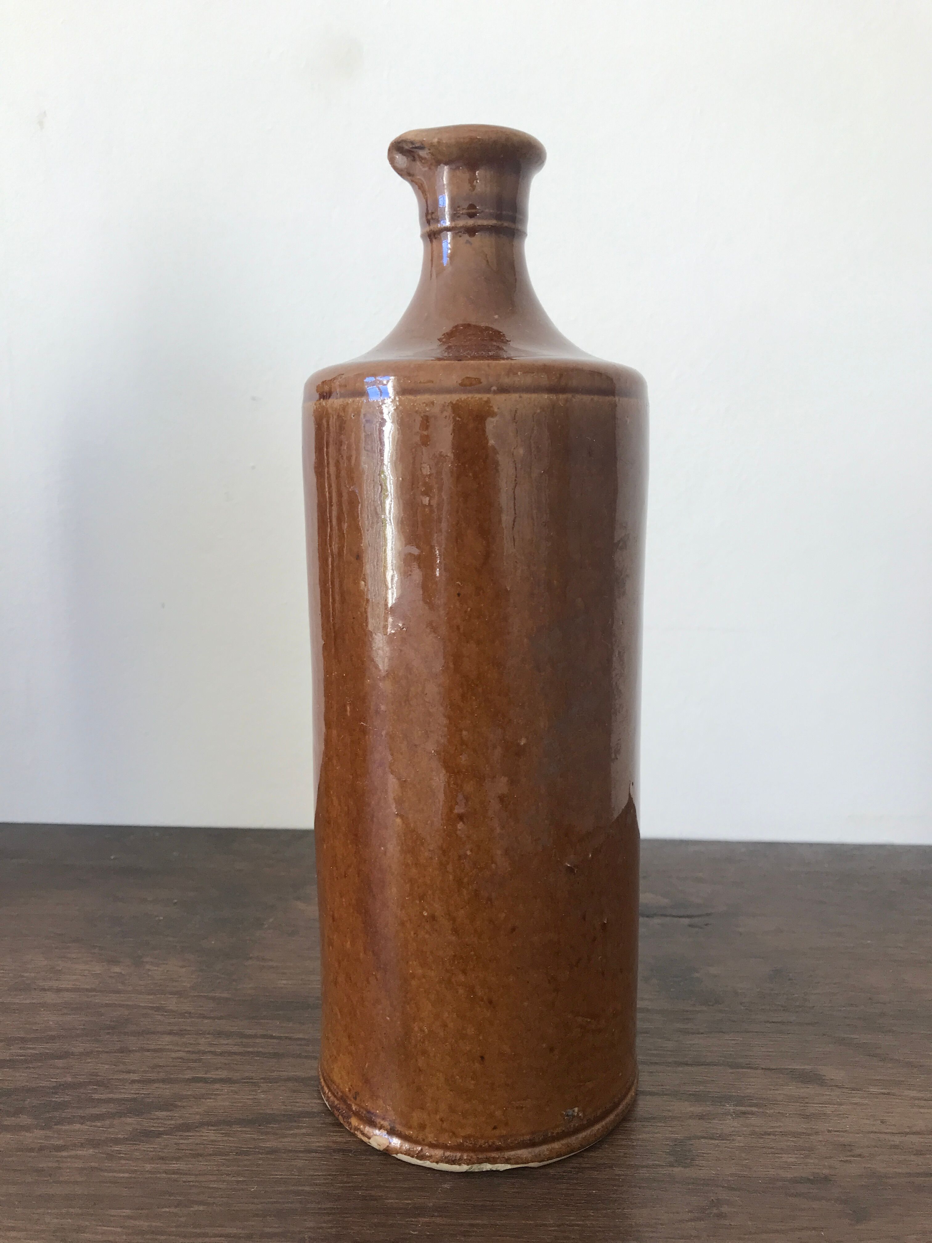 Pair of sandstone bottles