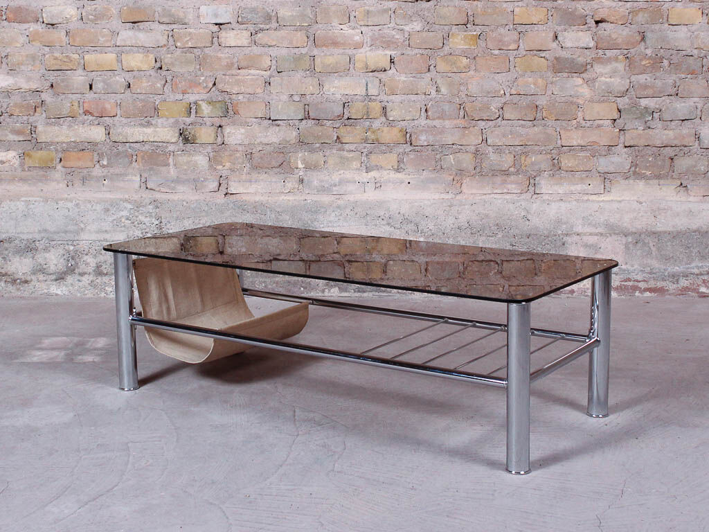 Glass rectangle coffee table with magazine rack, circa 1970