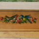 Ancient toy, wooden piano, decorating birds on rose bush