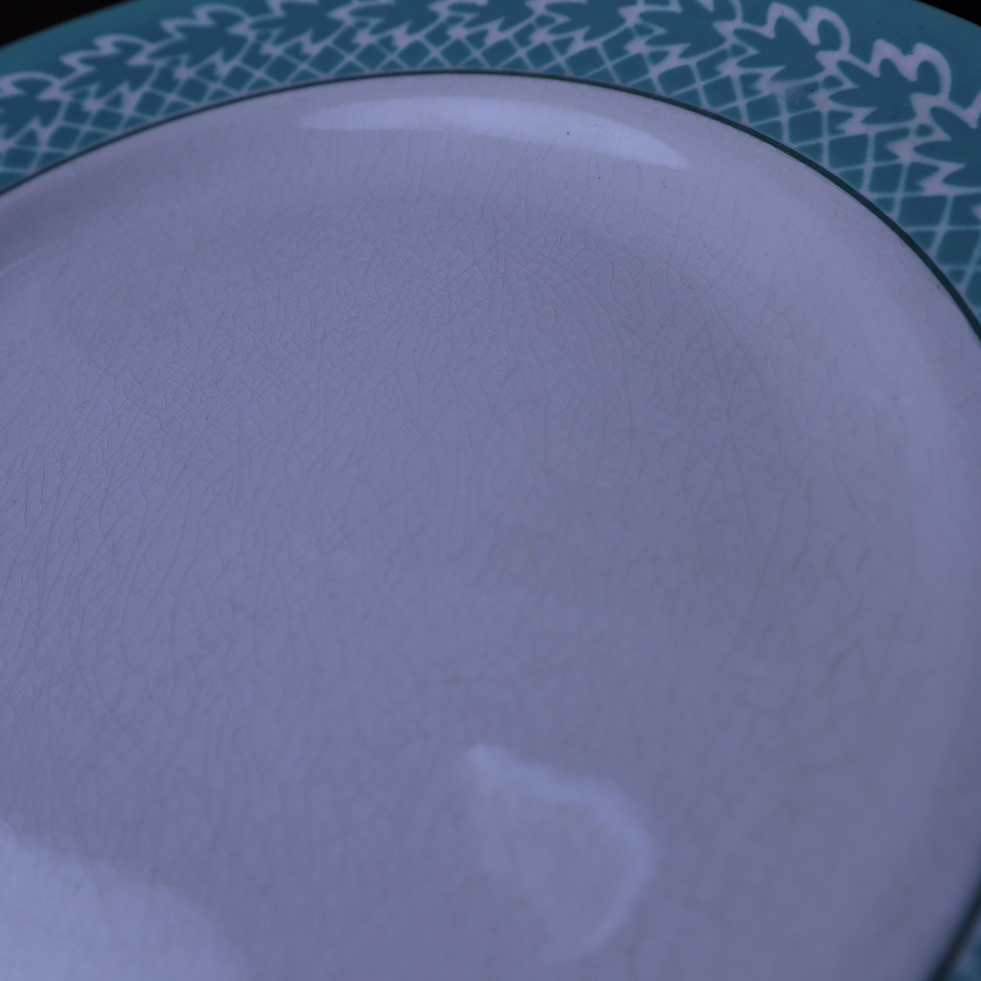 Set of 6 KIFO L'Amandinoise flat plates with green leaf design.