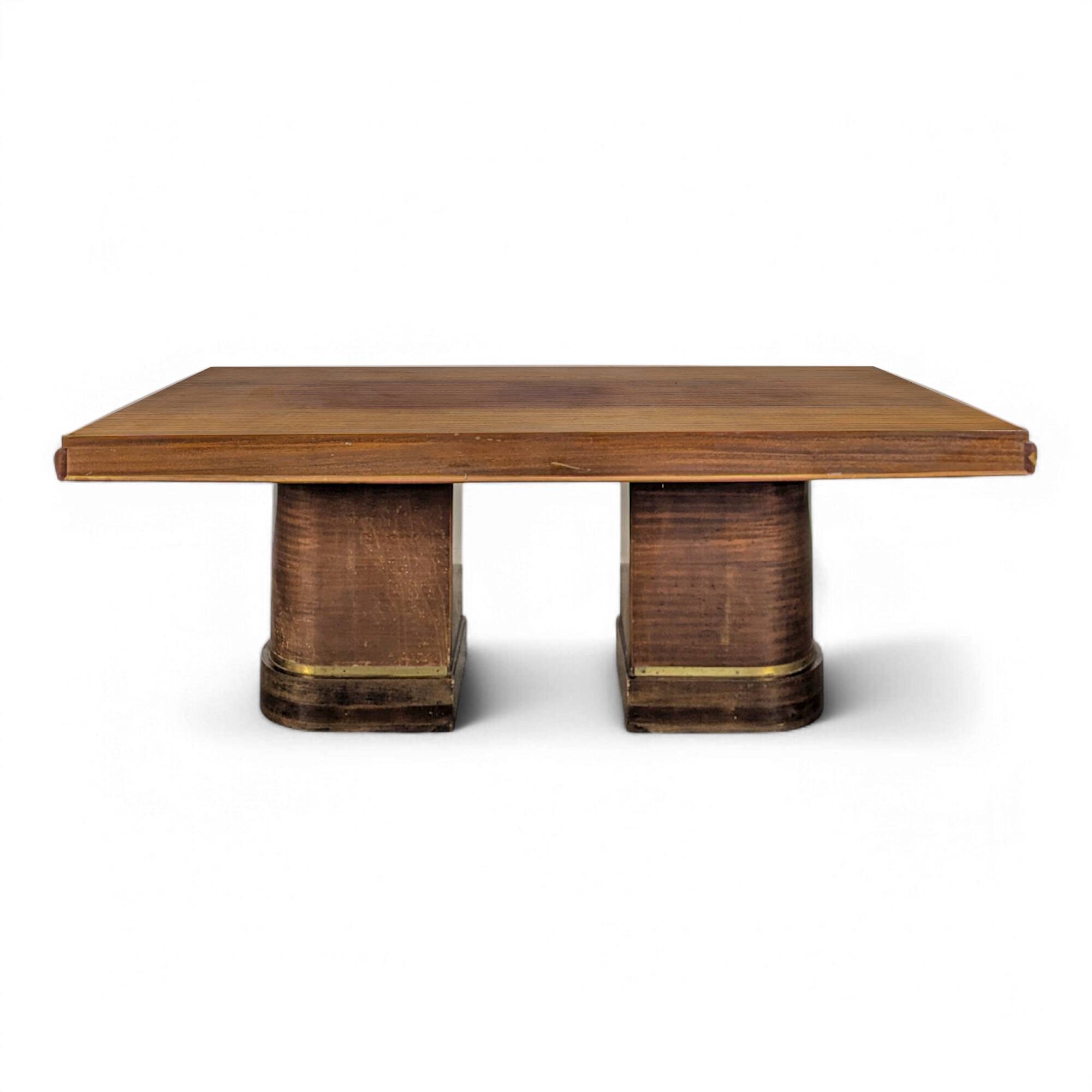 Modernist table in rosewood and brass