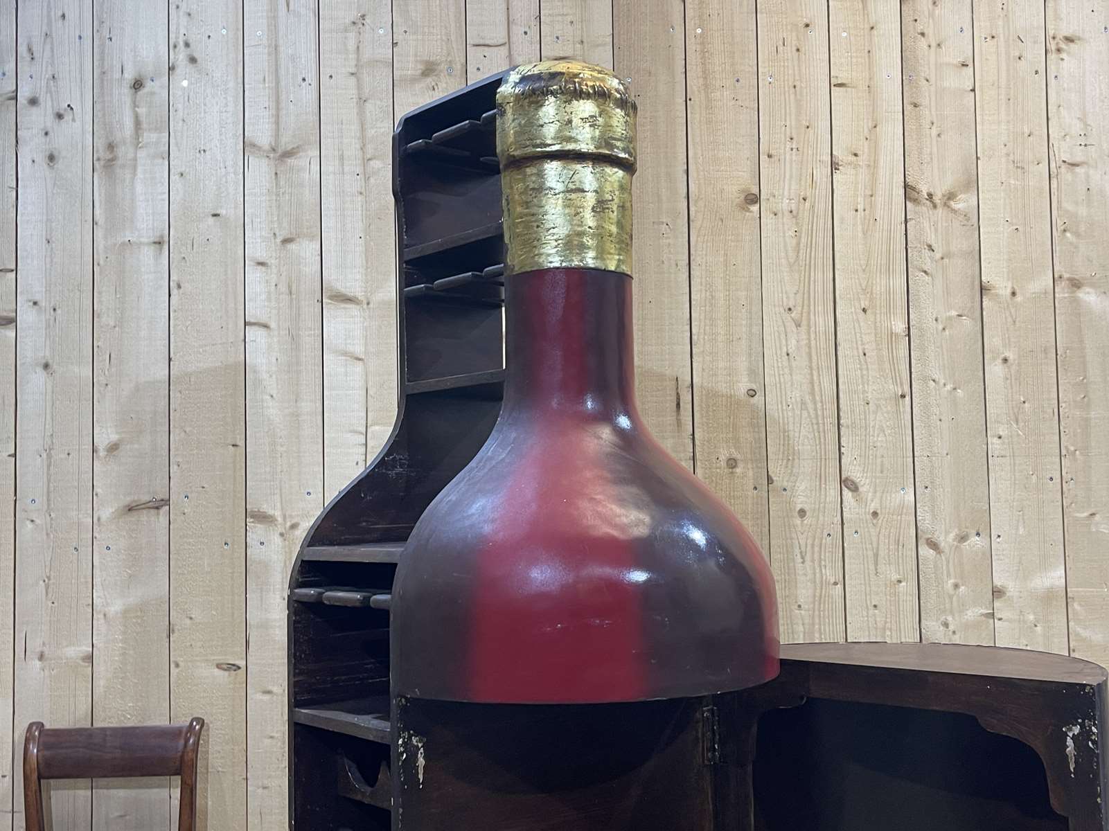 Advertising bar furniture in the shape of a giant wine bottle 90s