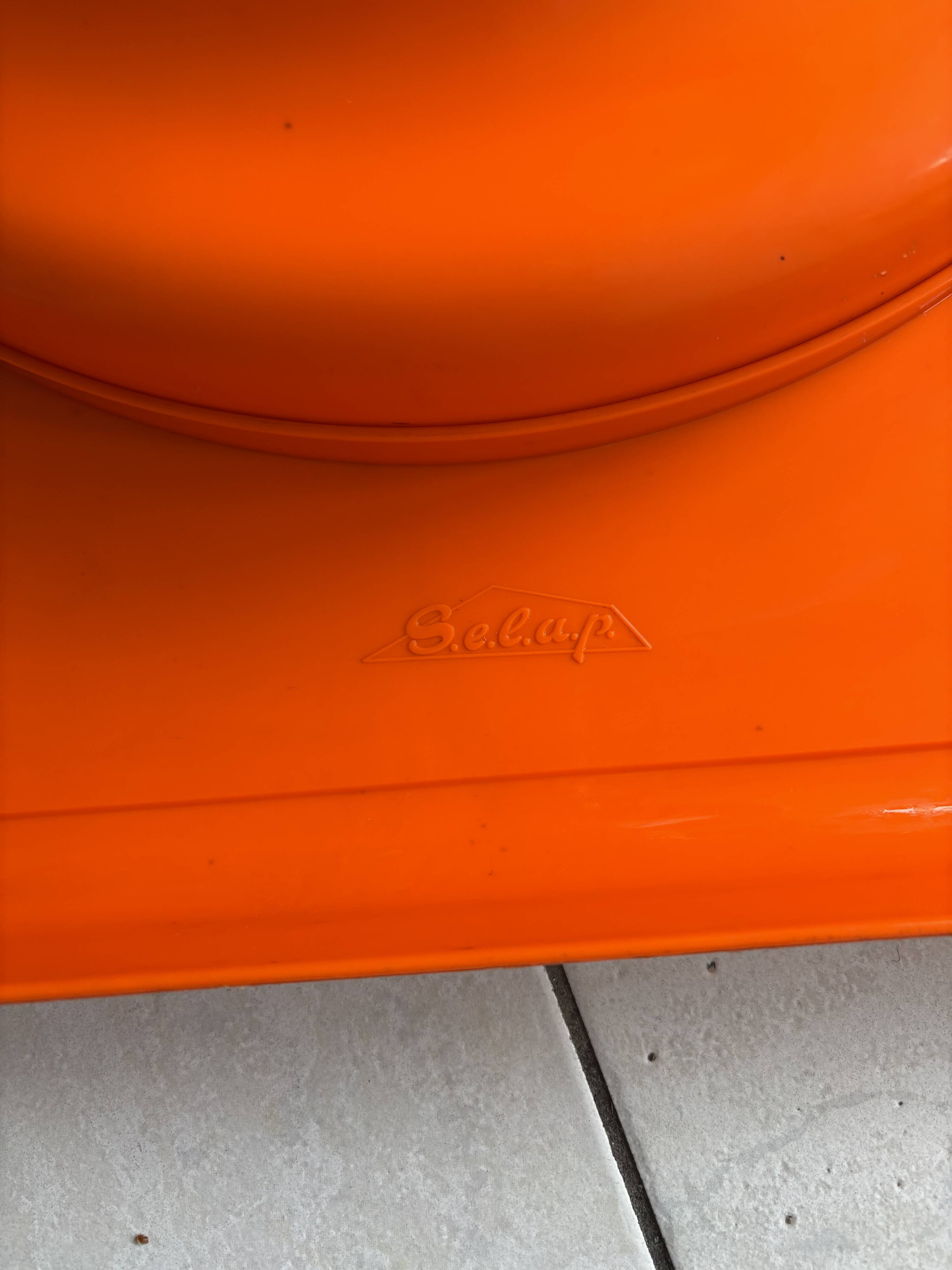 Orange plastic coffee table S.e.l.a.p.