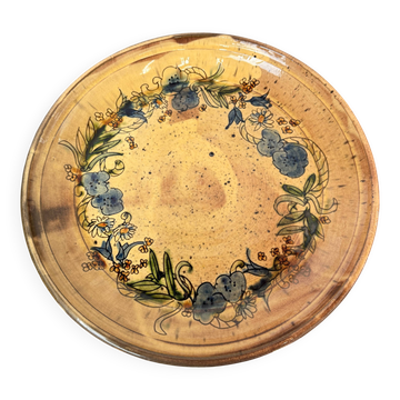 Grand plat rond vintage en céramique émaillée à décor floral