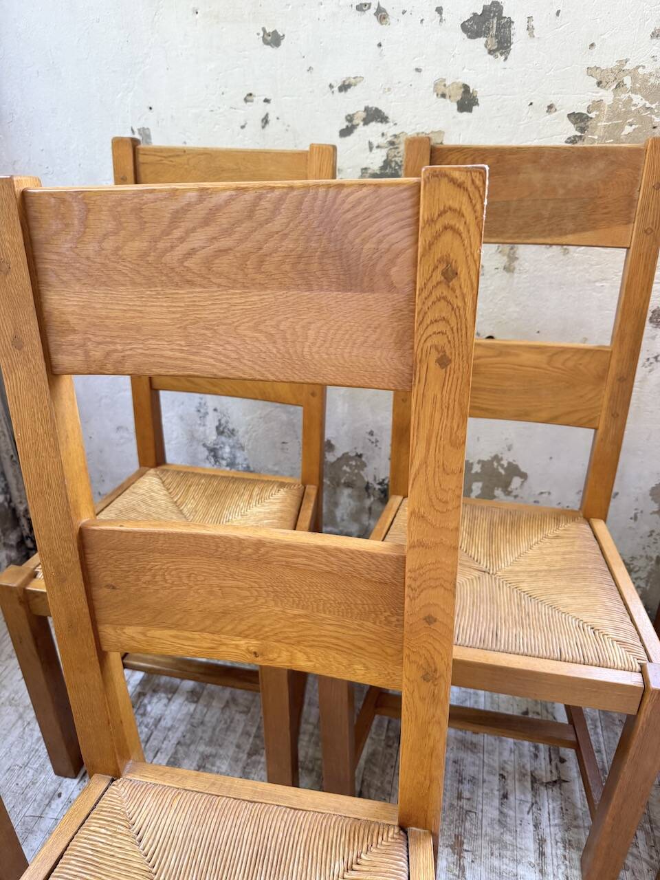 Set of 8 blond oak chairs with straw seats