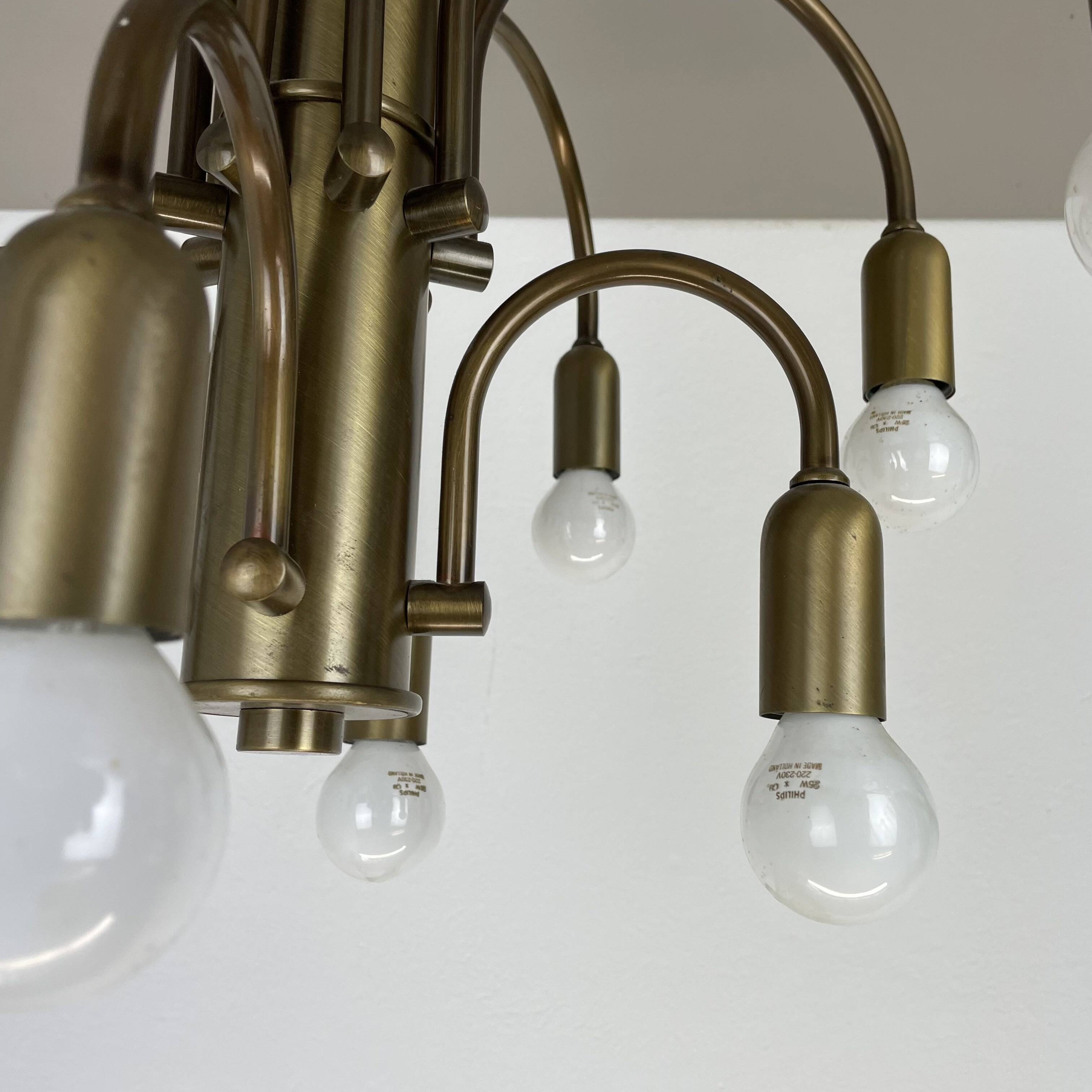 large 12-armed solid Brass ceiling light Chandelier by WKR Lights, Germany 1970s