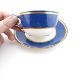 Antique Wedgwood teacup and saucer, bone china. Powder blue and gold English cup and saucer, 1900s