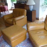 Tan leather sofa with natural graining, matching armchair and pouf