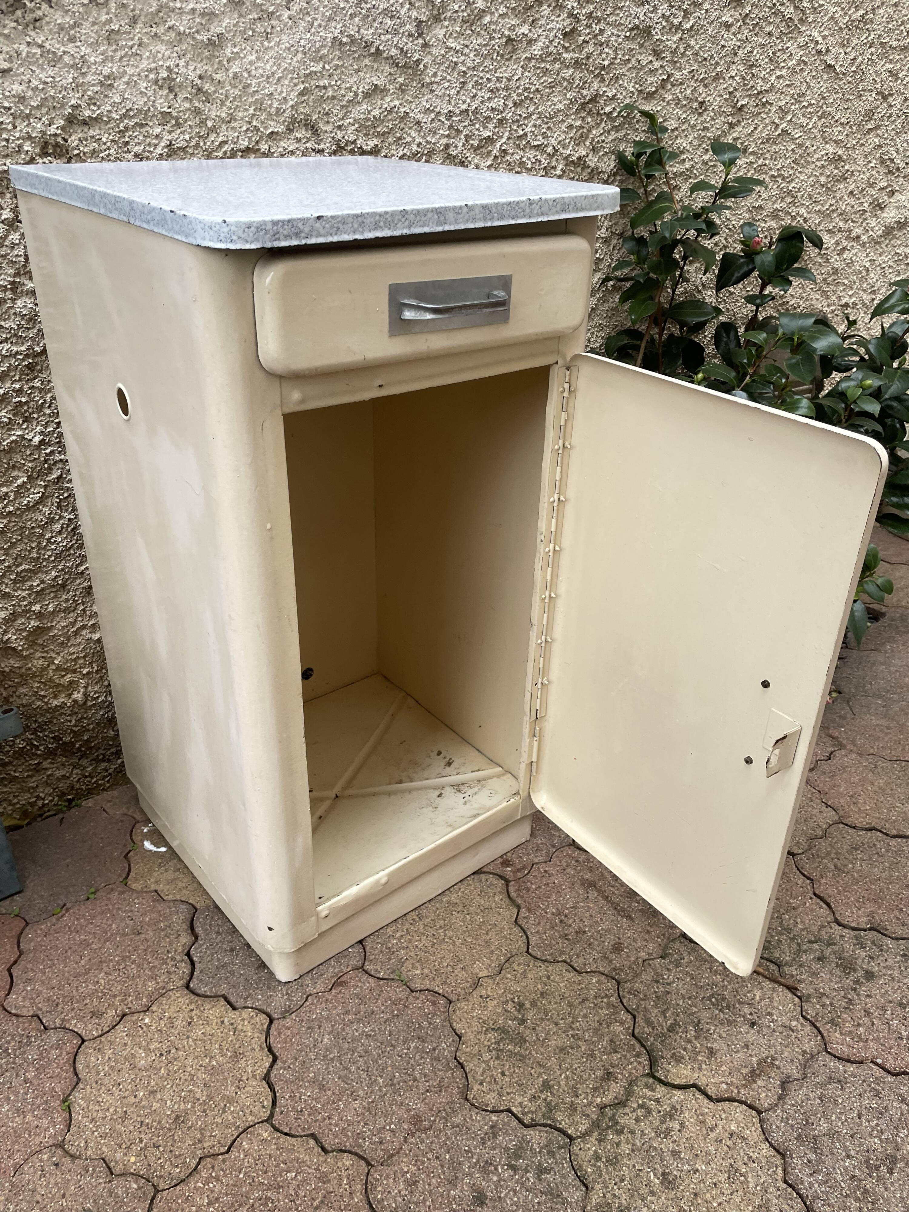 Furniture stored bottle in enamelled sheet metal