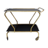 Golden serving trolley with black glass shelves, mid century bar trolley, elegant tea trolley