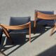 Scandinavian chairs in teak and black skaï.